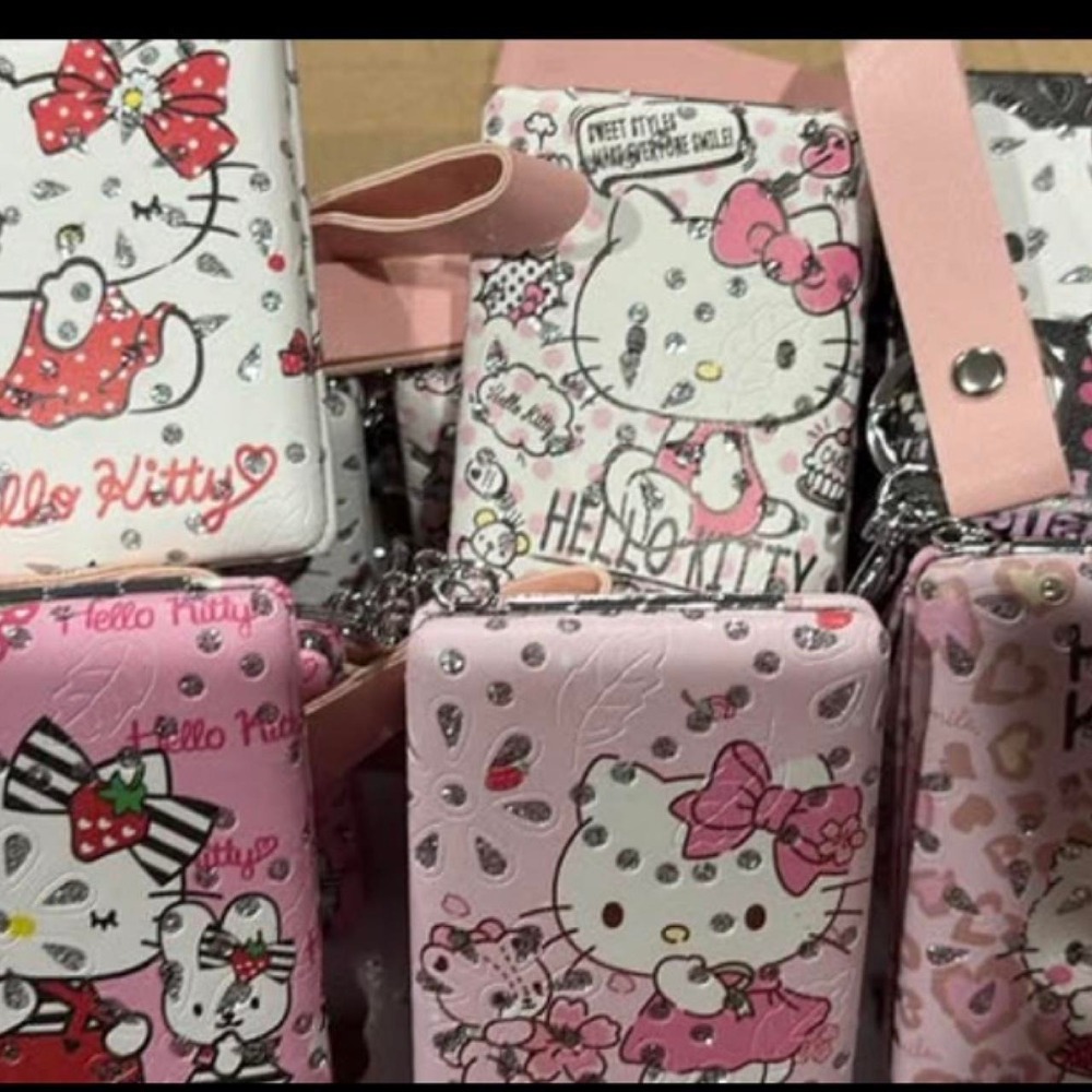 $4 each… Hello Kitty pink & white keychain mirror